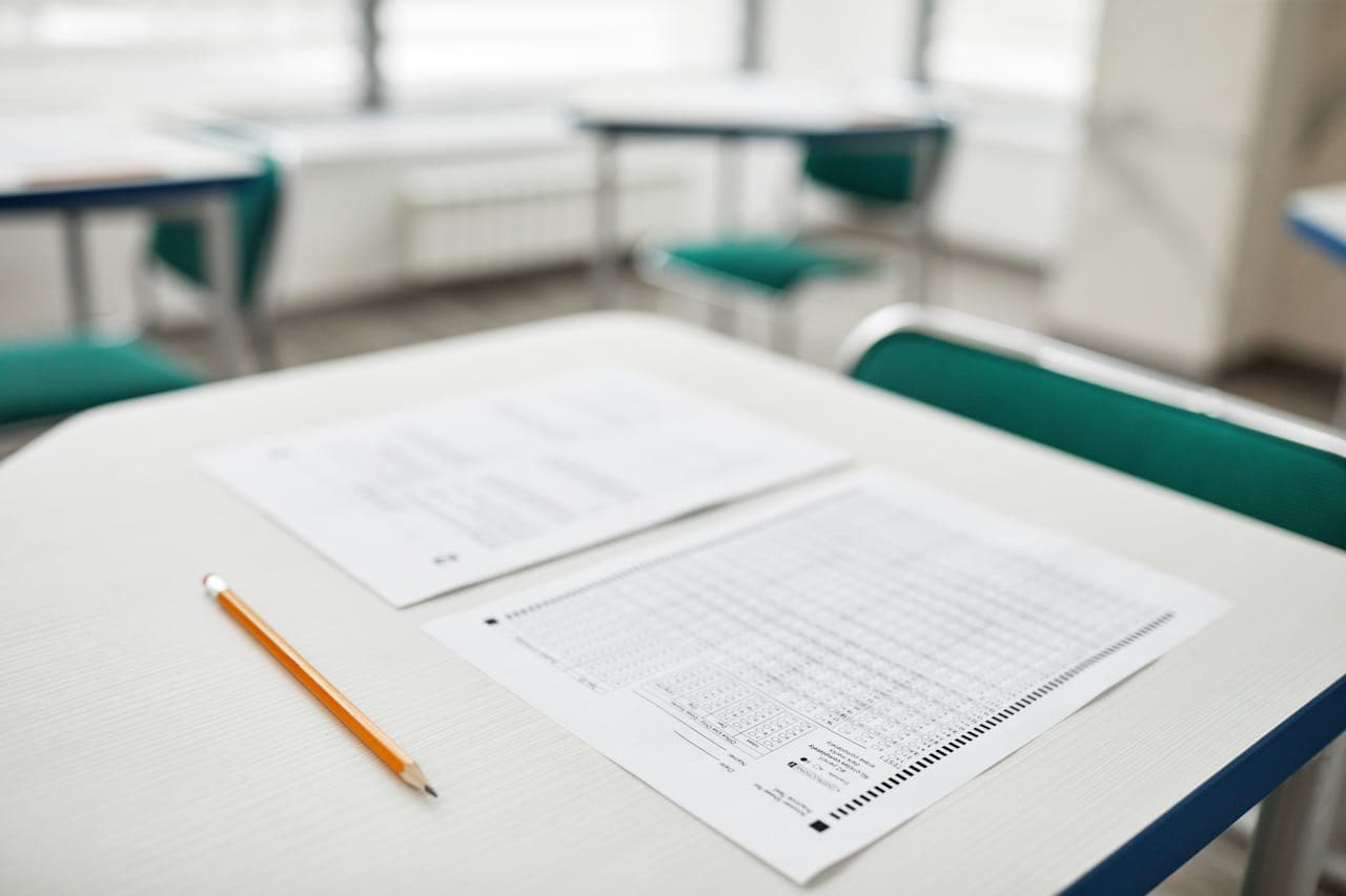 Student sitting at a desk taking an exam